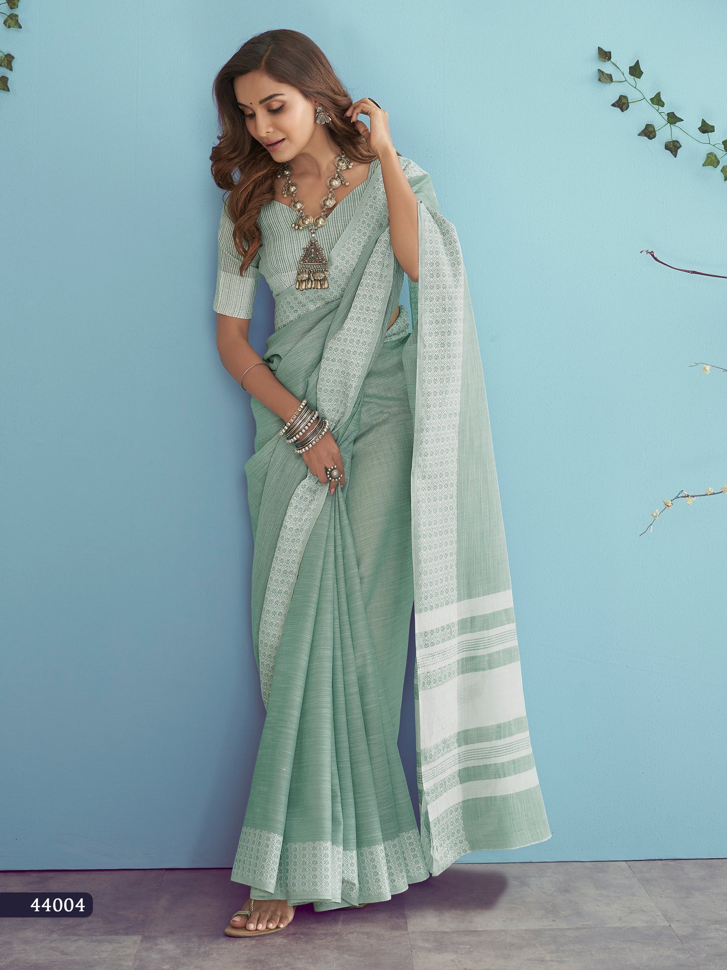 Mint Green Linen Silk Saree with Chikankari Embroidery and Weaved Border
