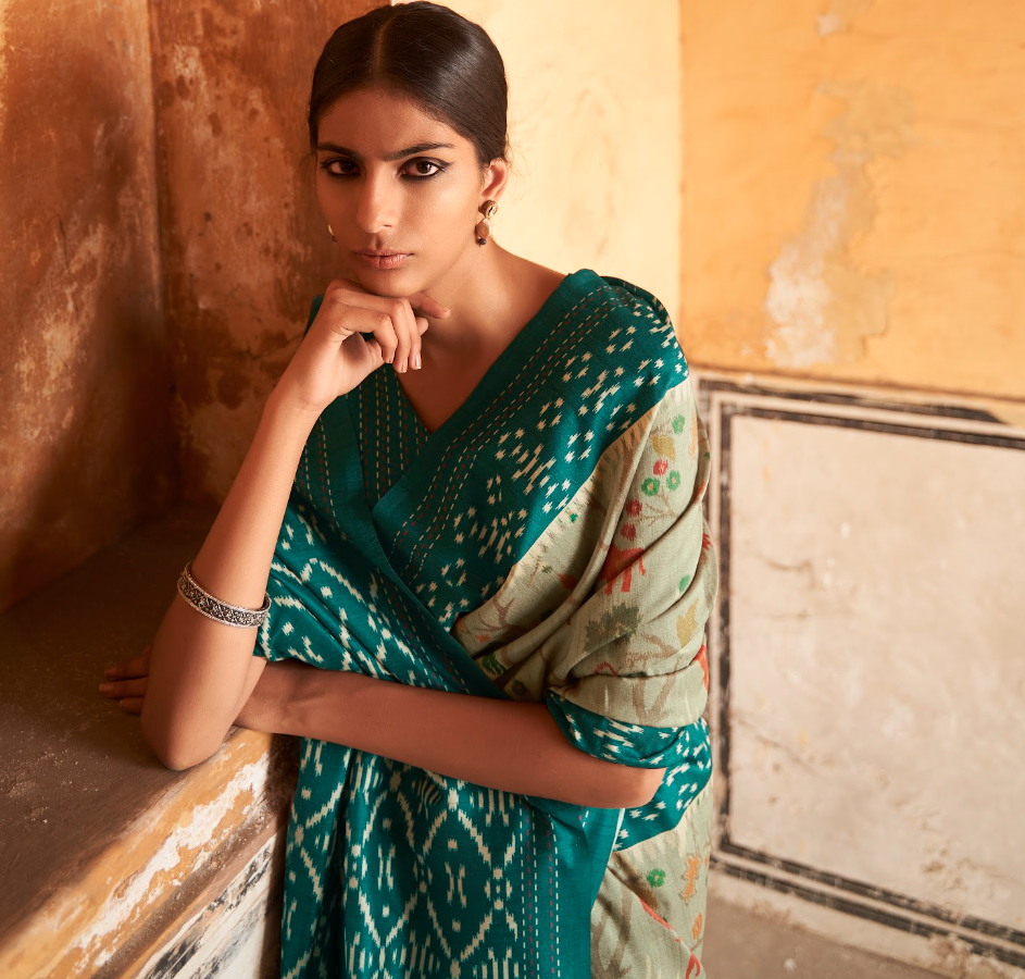 Sage Green Embroidered Tusser Silk Saree with Floral Fauna Motifs and Geometric Pallu