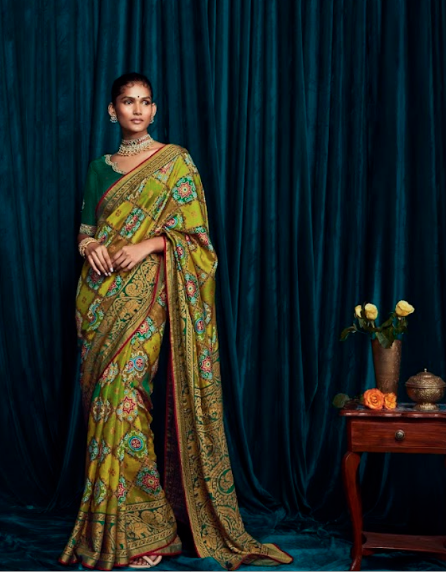 Mustard Yellow Brasso Silk Saree with Verdant Green, Radiant Red, and Gleaming Gold Patterns and Designer Work Blouse