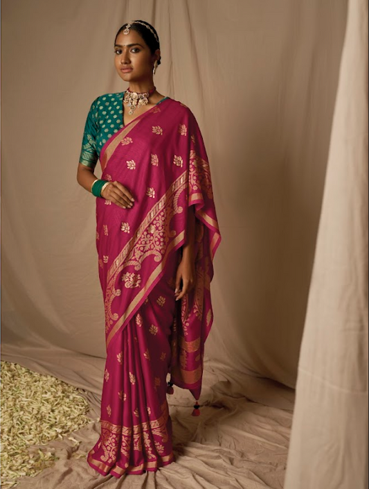 Magenta Brasso Silk Saree with Traditional Latkans and Unstitched Blouse