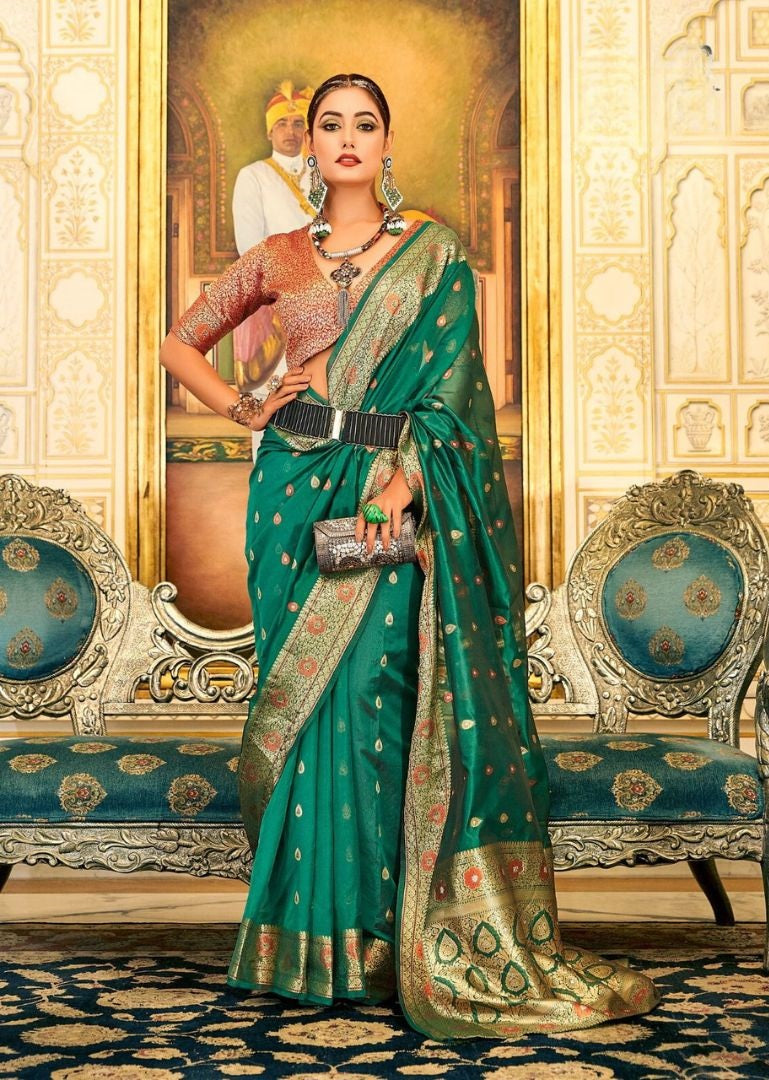 Emerald Green Organza Silk Saree with Copper Zari Weave and Vibrant Orange Brocade Blouse Piece