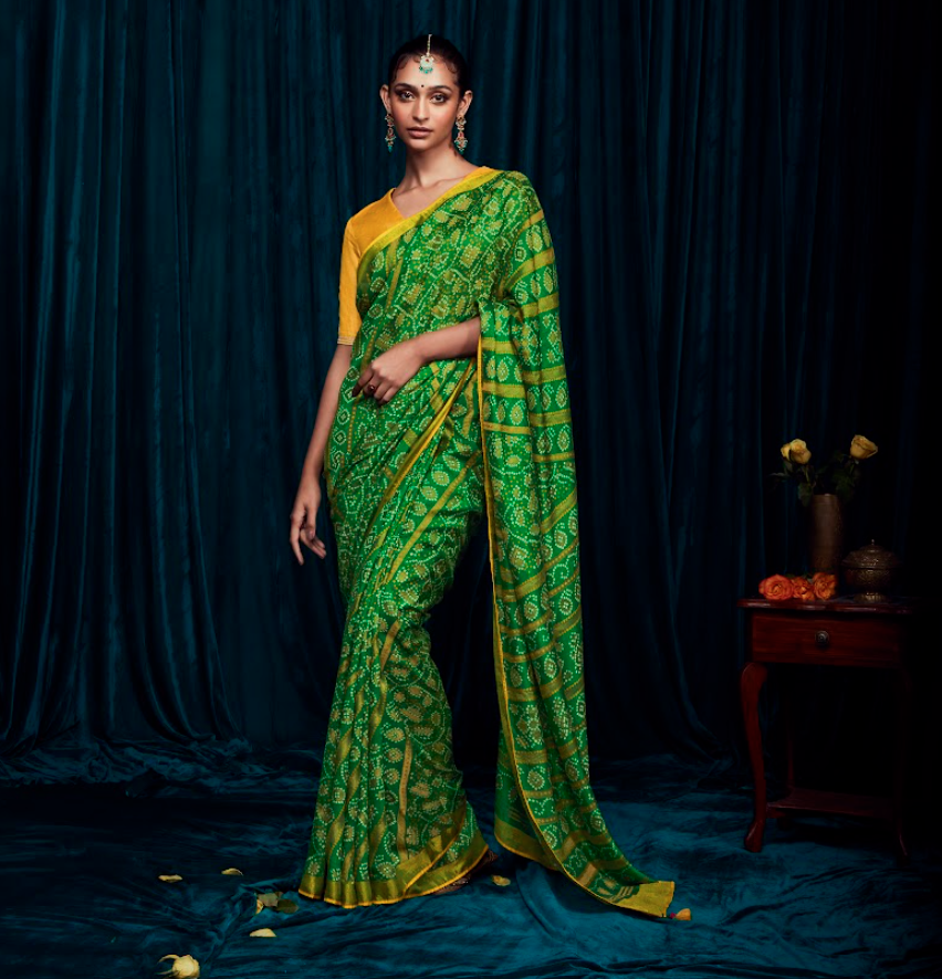 Lustrous Green Silk Saree with Golden Yellow Motifs Symbolizing Grace and Artisan Craftsmanship