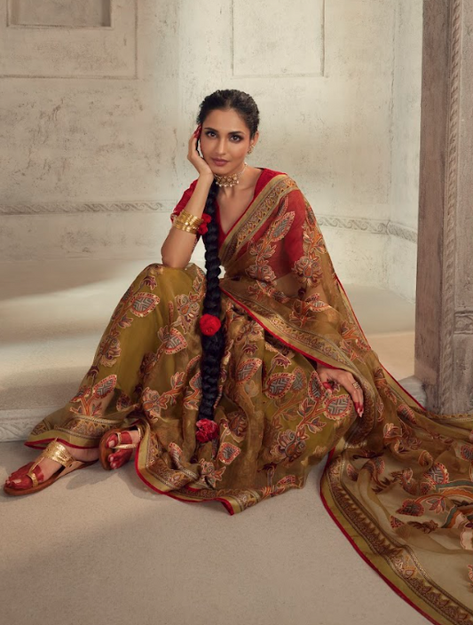 Regal Onyx Brasso Saree with Red Gold Weave and Peacock Green Highlights Paired with Designer Blouse