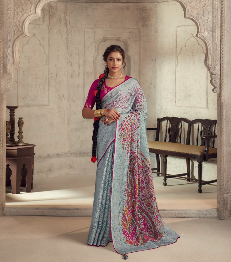 Dusty Blue Brasso Saree with Magenta, Gold, and Teal Motifs and Harmonizing Magenta Blouse Piece