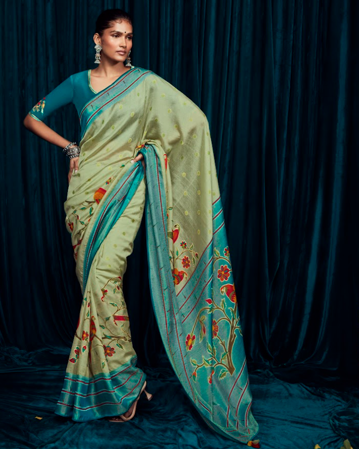 Pistachio Green Soft Brasso Silk Saree with Sky Blue Border and Red Yellow Floral Motifs with Designer Work Blouse